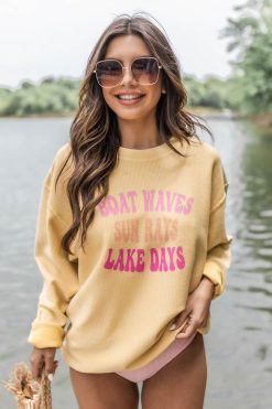 Coupon 🛒 Pink Lily Boat Waves Sun Rays Lake Days Gold Corded Graphic Sweatshirt ⭐